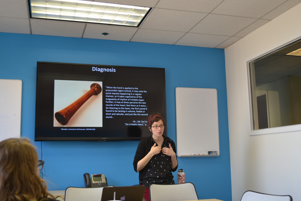 NMNH fellow Ashely Bowen-Murphy presenting her research in front of fellows and interns.