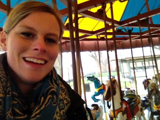 2015 Winter Intern Marilyn Bradford enjoying her first ride on the National Mall carousel
